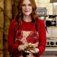 She’s wearing an apron with poppies on it. That’s dedication. (Image via Empire Magazine)